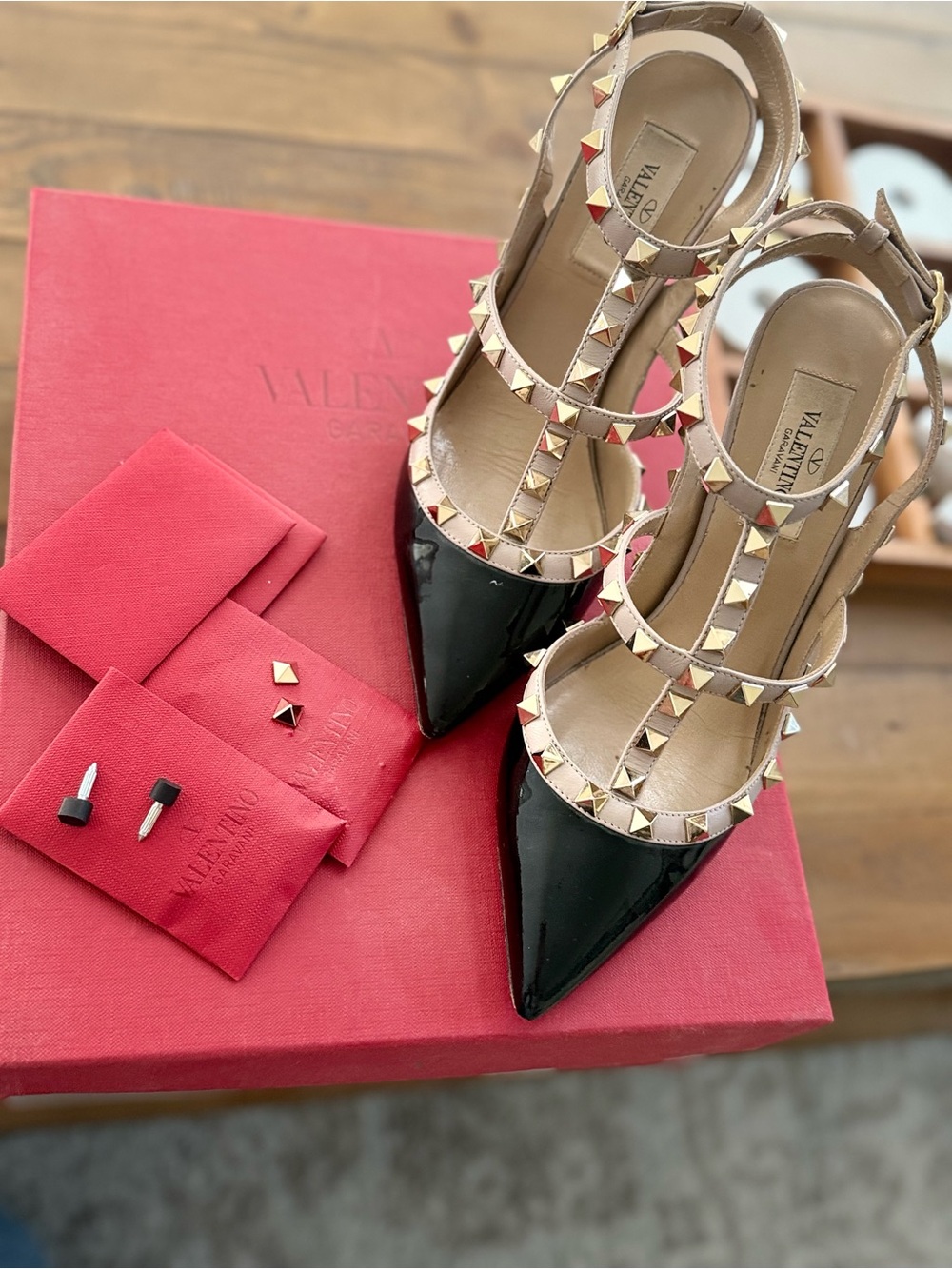 Valentino Garavani Black Patent Rockstud T-Strap Pumps with Gold Studs